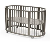 Stokke Sleepi Bed, Hazy Grey - Ovaal ledikant geschikt voor kinderen van 0-5 jaar - Verstelbaar, stijlvol en flexibel - Stevig beukenhouten frame